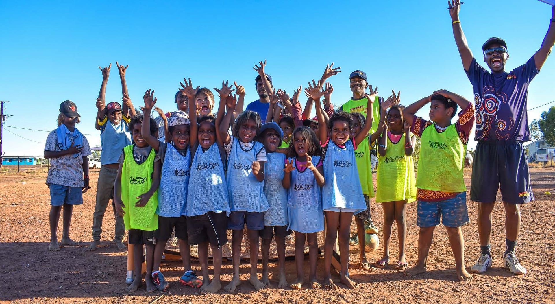 School kids waving