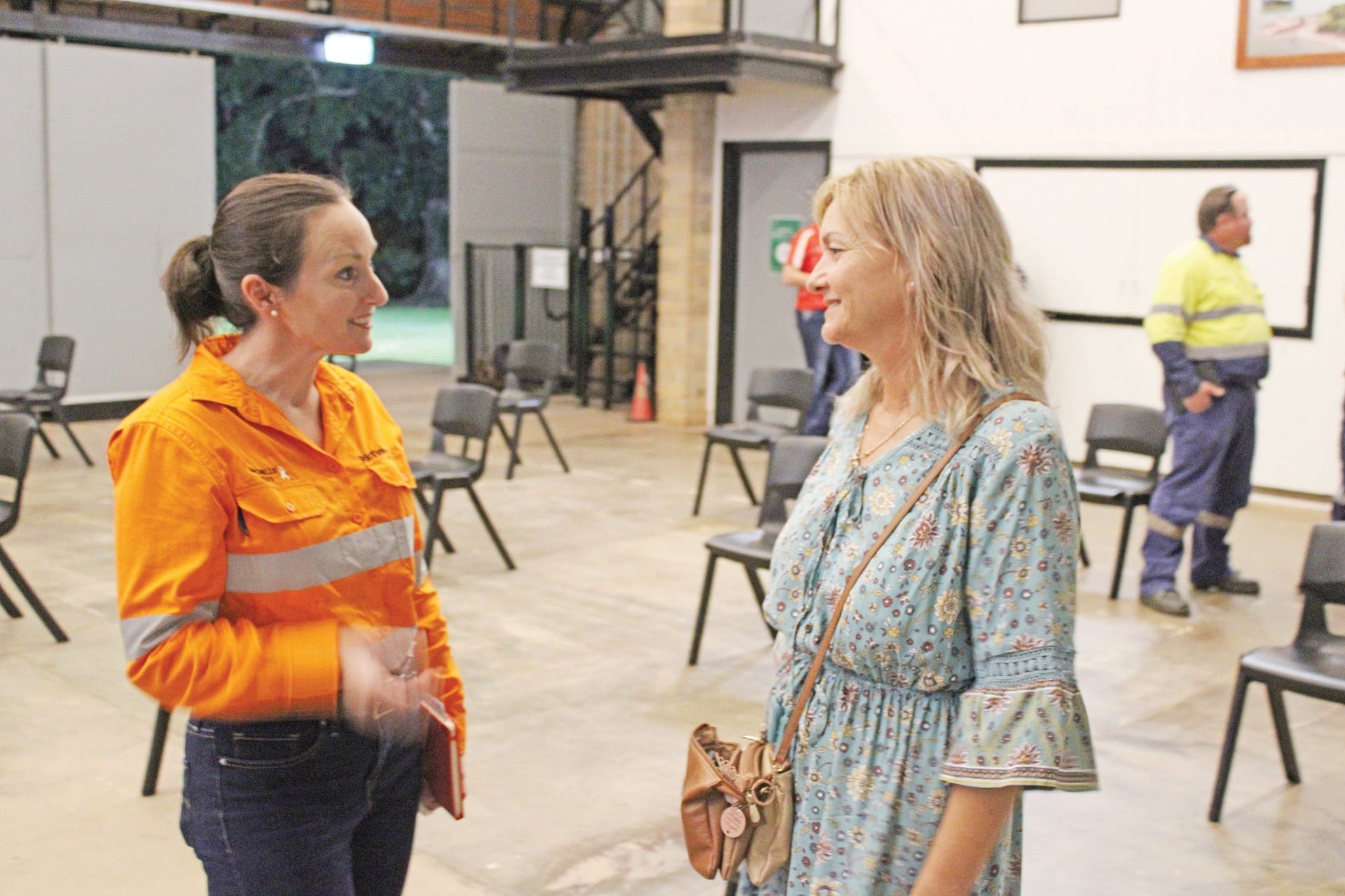 Michelle Elvy with local resident after Rio Tinto forum