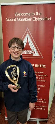 Ben Durik with his Under 12 years Young Performer’s Scholarship Trophy