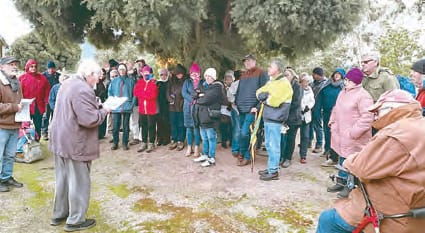 John Whitehead spoke about his ancestors, the Playle family, on the walk.
