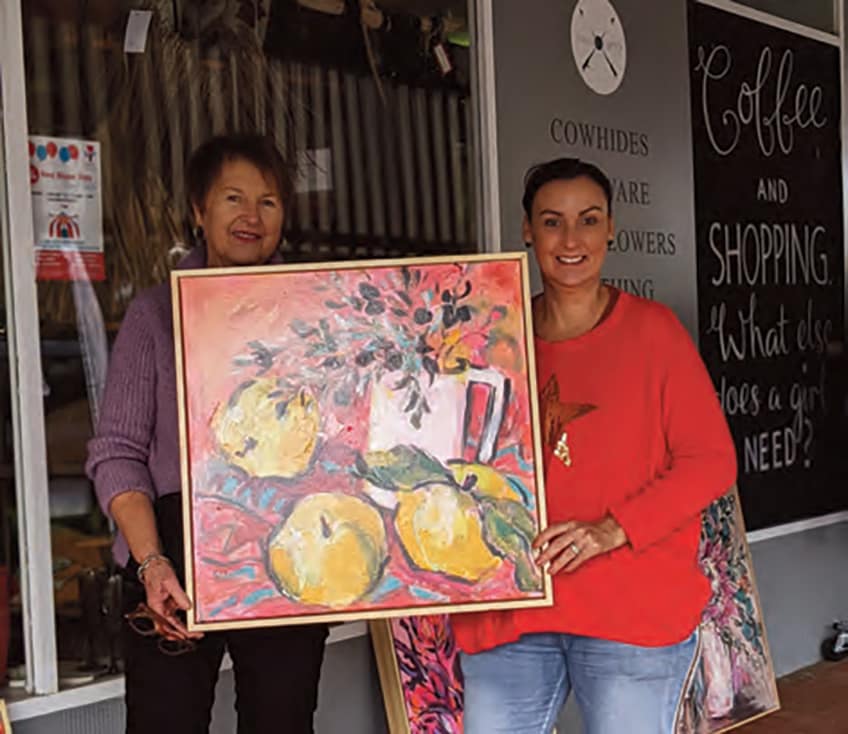 Mel Corbett of Fisher & Farmer with visiting Wagga artist Bev Harris.