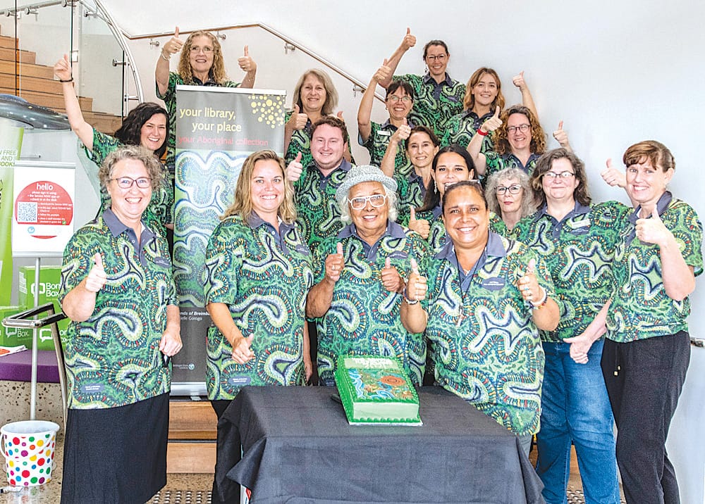 Danielle Gorogo and library staff