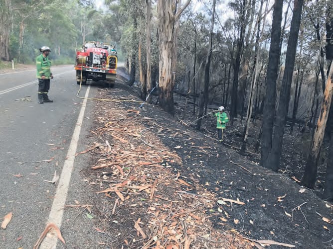 Crew hose down fire field