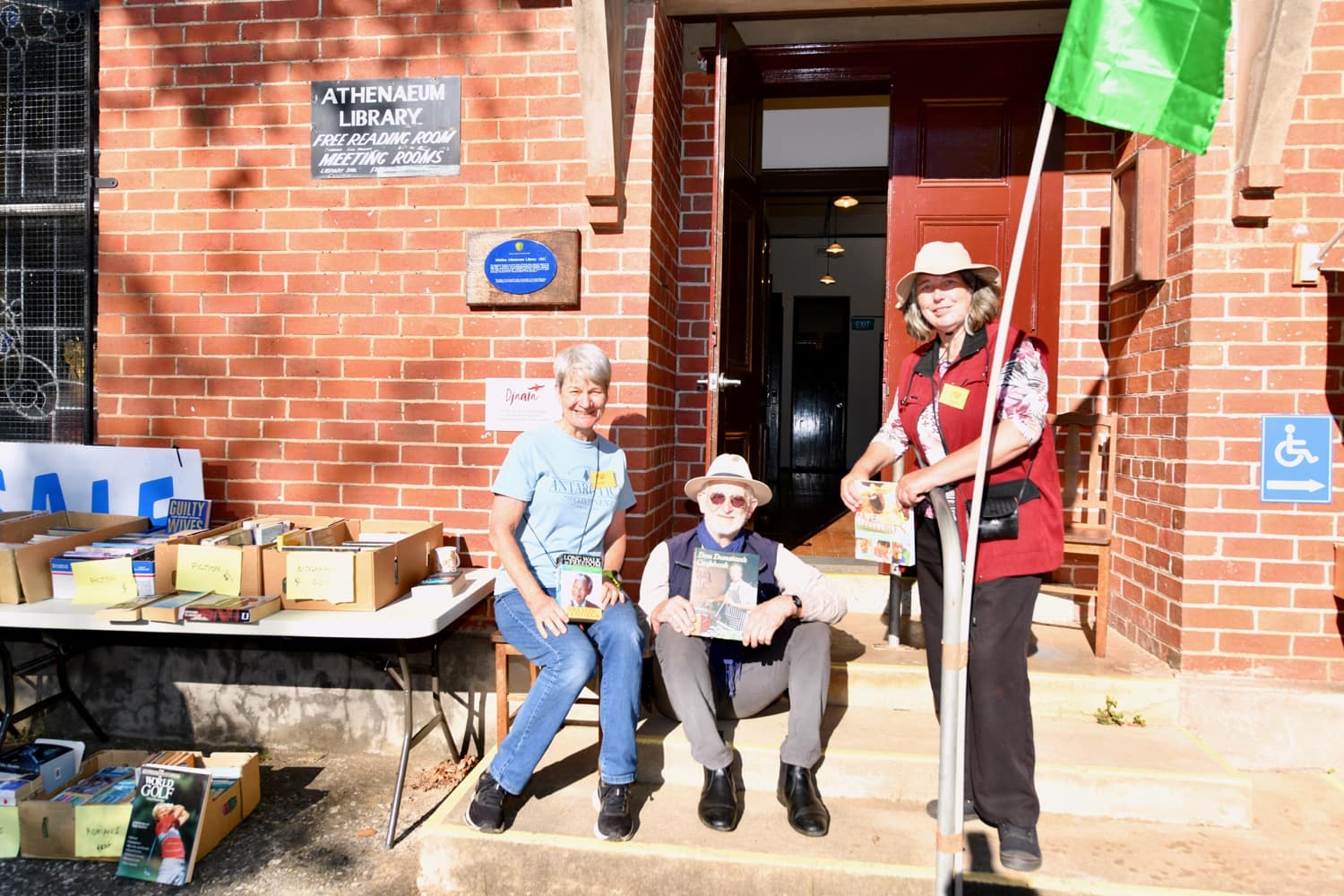 Volunteers at the Athenaeum Library garage sale that raised over $500.