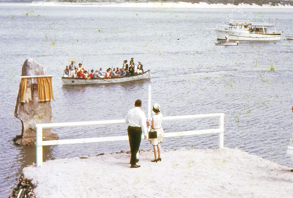 Queen Elizabeth II unveils a monument rock in the Endeavour River in 1970.