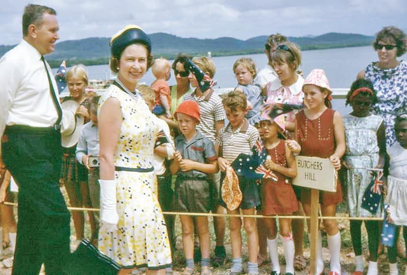 Queen Elizabeth is greeted by students and parents from the Butchers Hill School.