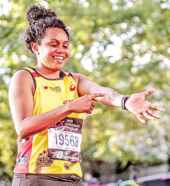 Joy after crossing the line in London.