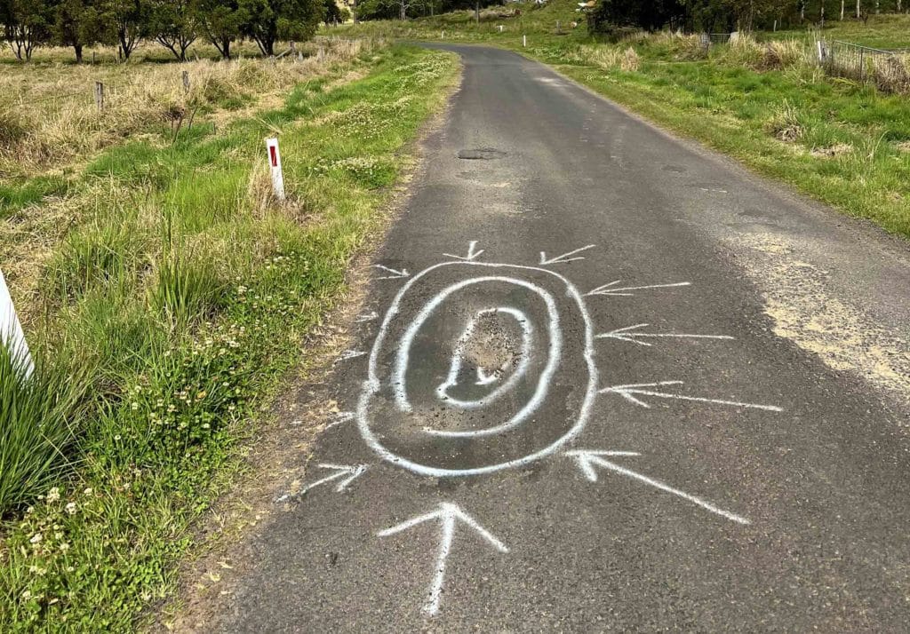 Fix me! Marked pothole on Duck Creek Rd, Old Bonalbo.