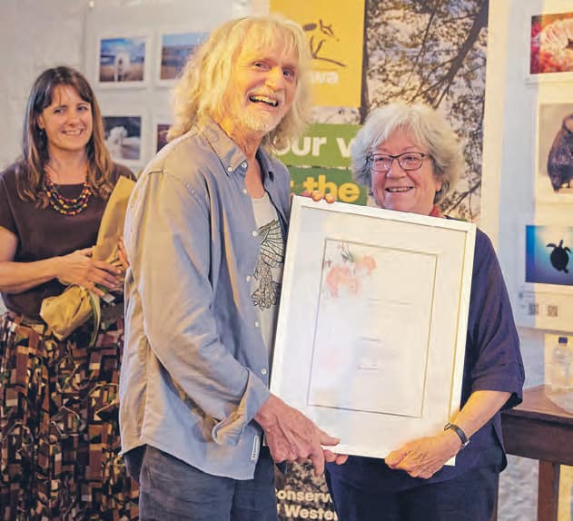 Geoff Evans being presented award