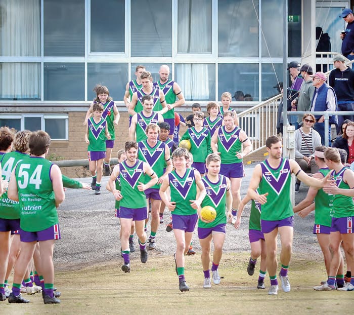Under-14s and seniors run out on their home ground. Photo courtesy The Buloke Times