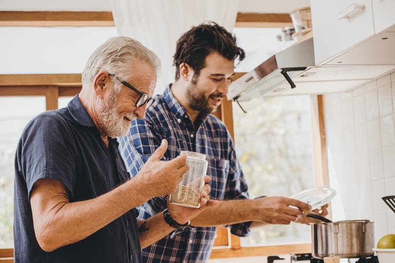 Father and son cooking